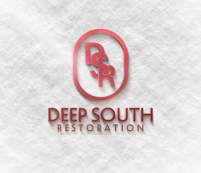 Logo of Deep South Restoration with red text and design on a white background.